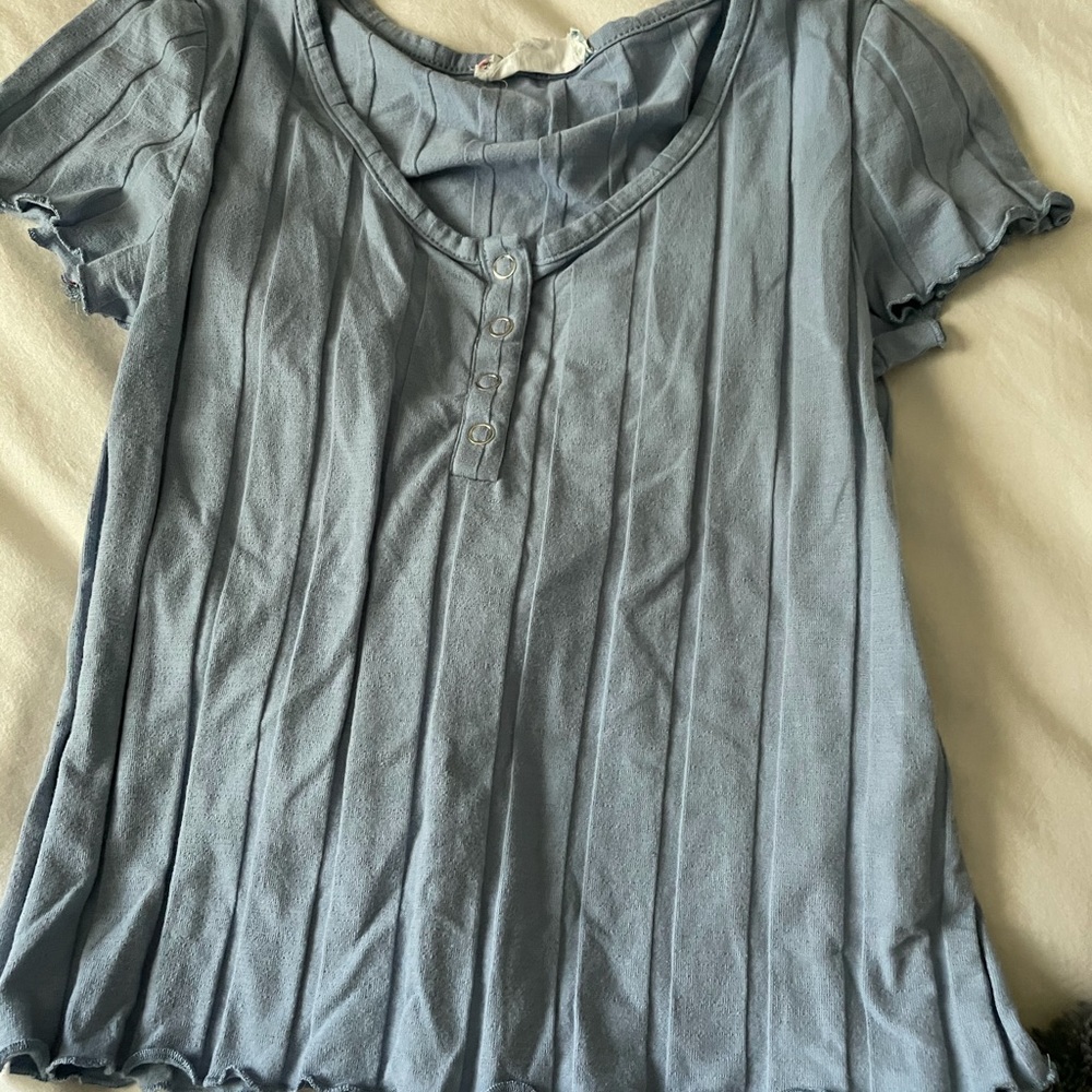 Ruffle button shirt